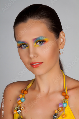 Woman and multicolored make-up.