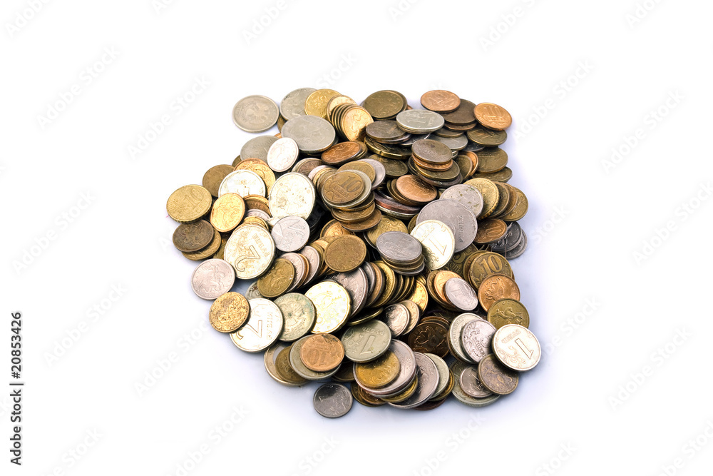 A handful of coins on a white background, isolated A handful of coins on a white background, isolated