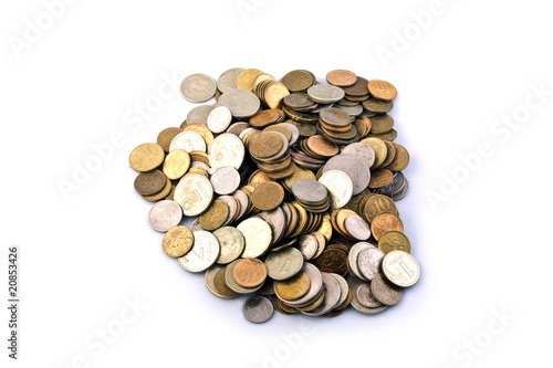 A handful of coins on a white background  isolated