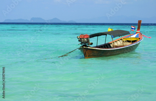 Traditional longtail boat in Andaman sea, Thailand © katatonia