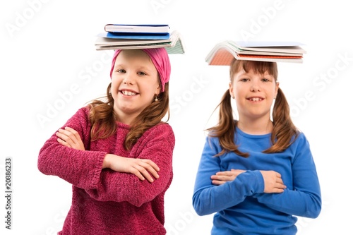 Girls with books on head