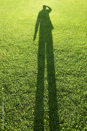 shadow of looking man on grass