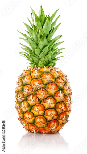 ripe ananas fruit with green leaves
