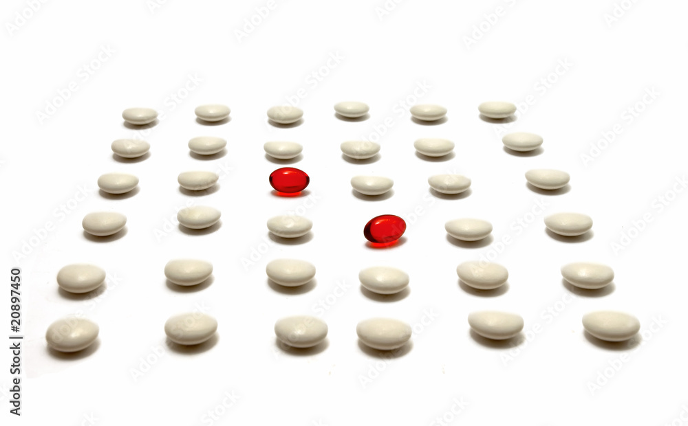 medication pills laying over white background medication pills laying over white background