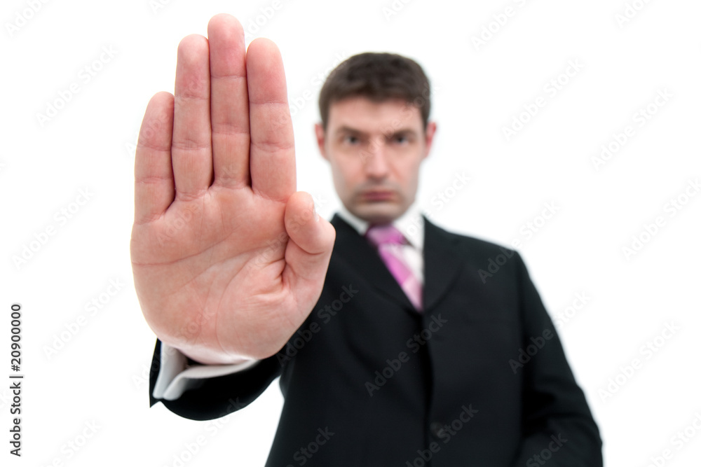Businessman Indicating STOP With His Hand Businessman Indicating STOP With His Hand