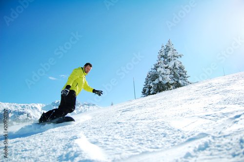 Snowboarder in Yellow Jacket