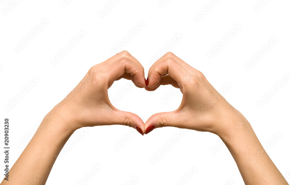 Obraz premium Heart shape formed with woman's hand