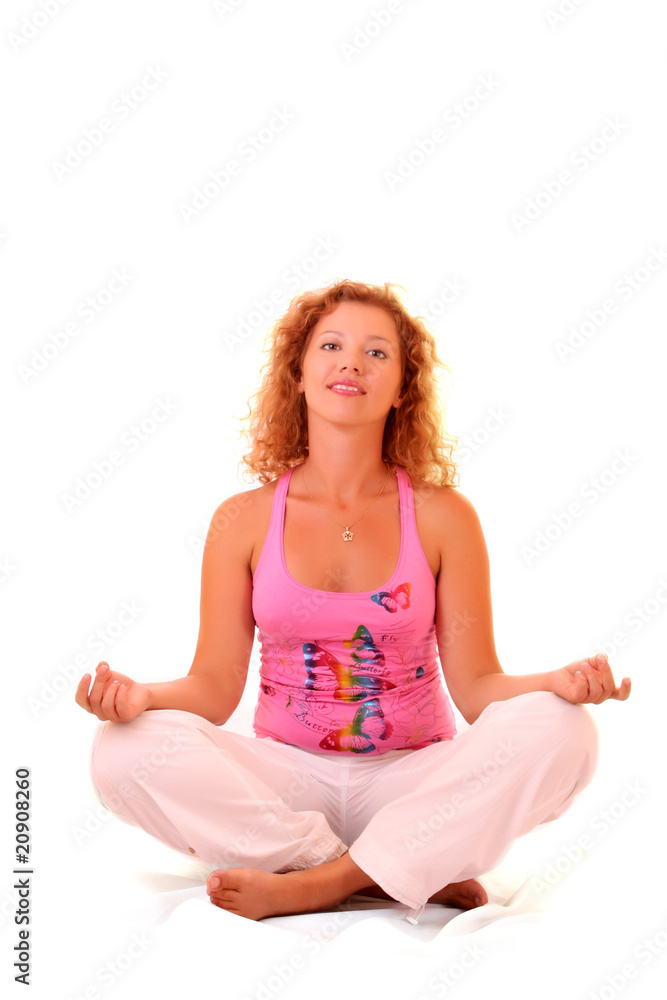 Young woman doing yoga exercise over white Young woman doing yoga exercise over white