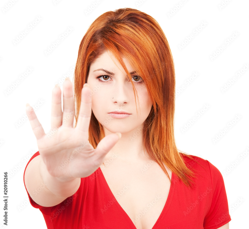 Fototapeta premium woman showing stop sign