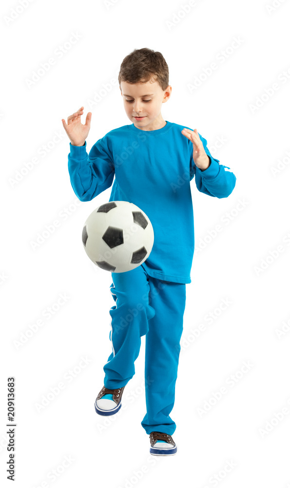 Boy executing a football kick Boy executing a football kick
