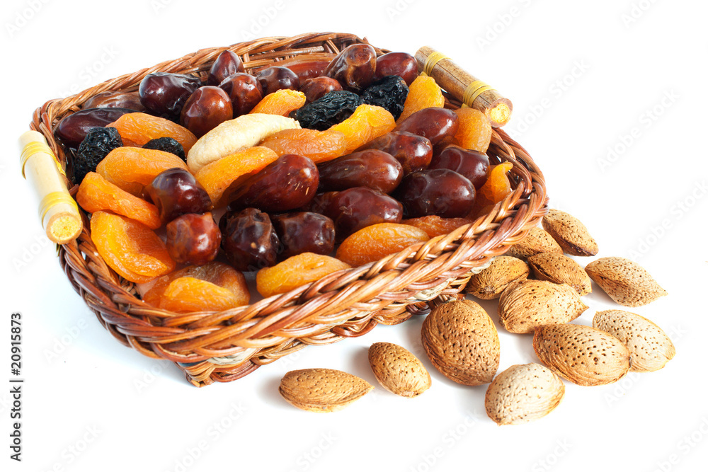 Almonds and dry fruits isolated on white background Almonds and dry fruits isolated on white background