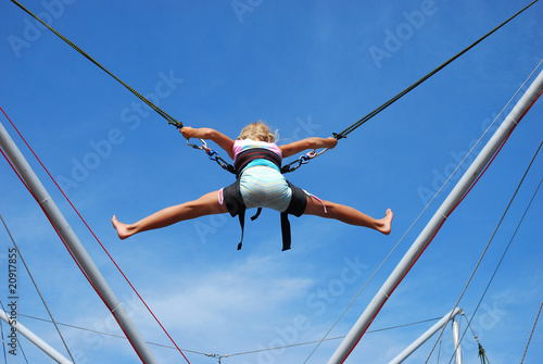 young girl on rope jumping
