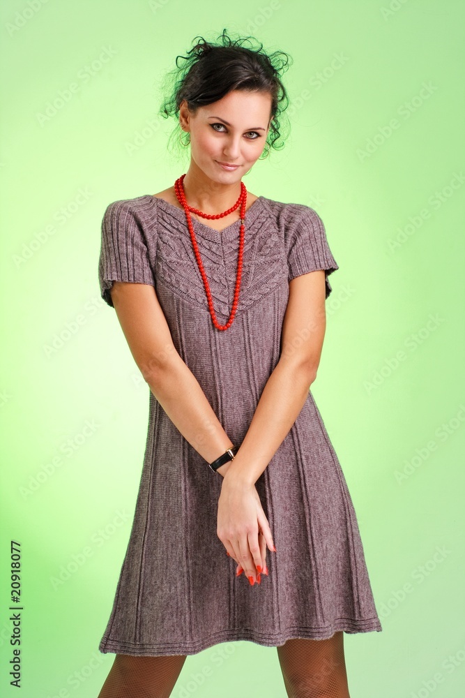 woman with red necklace