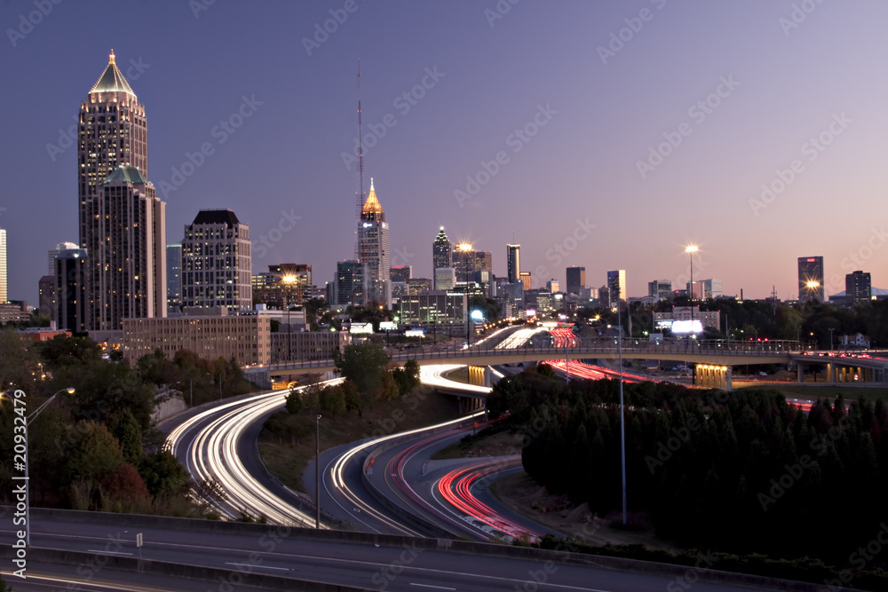 Atlanta skyline just before sunset with traffic streaks