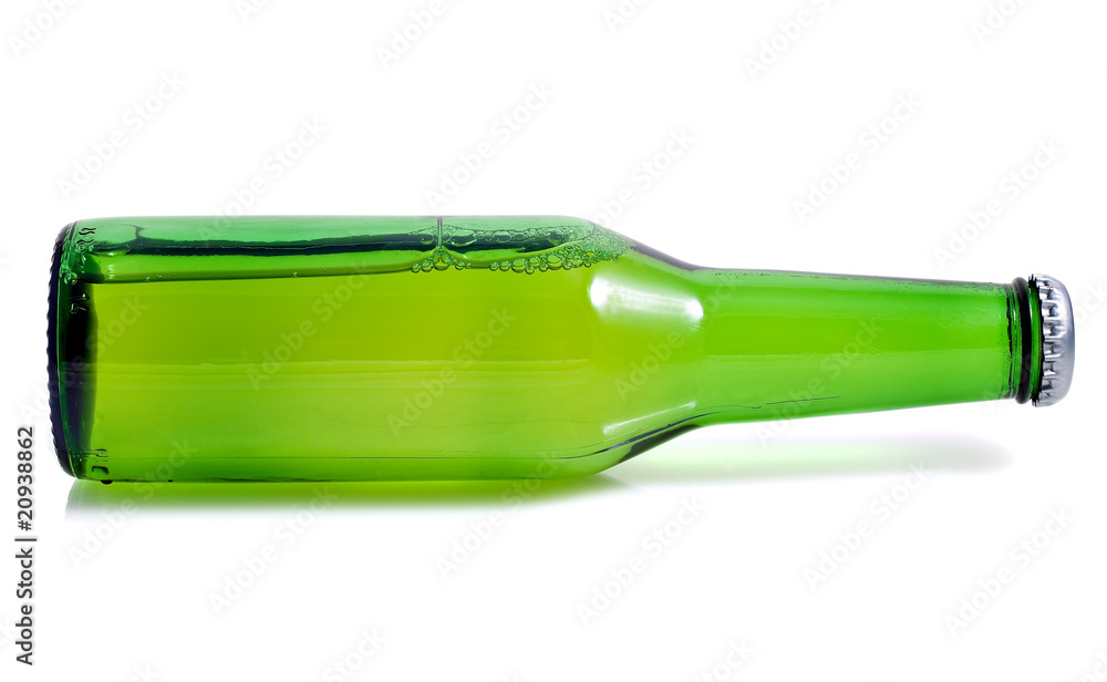 Green beer bottle in a horizontal position Green beer bottle in a horizontal position