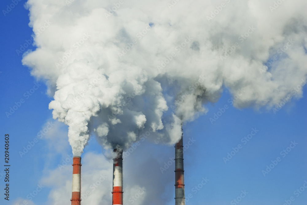 Smoking pipe on a background of the blue sky Smoking pipe on a background of the blue sky