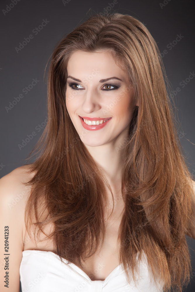 Smiling girl isolated in studio Smiling girl isolated in studio