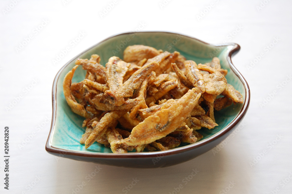 snack dried anchovies with white background snack dried anchovies with white background