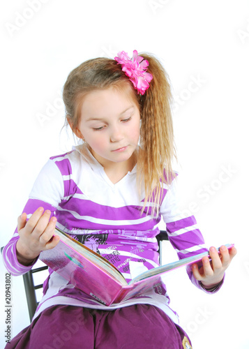 CHILD READING A BOOK