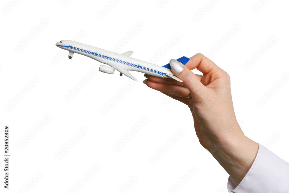 Toy airplane in hand. Toy airplane in hand.