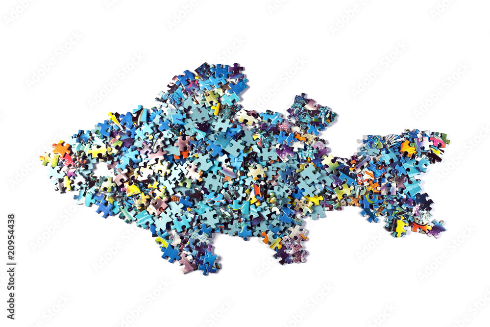 Obraz premium fish made from the puzzle , isolated