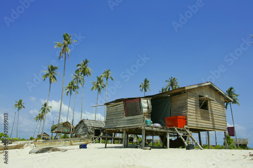 Native house of the Bajau Laut at the Sibuan Island, Borneo photo