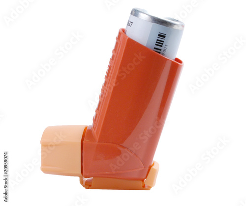 Asthma inhaler isolated on white photo