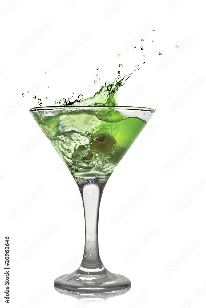 Green alcohol cocktail with splash isolated on white Green alcohol cocktail with splash isolated on white