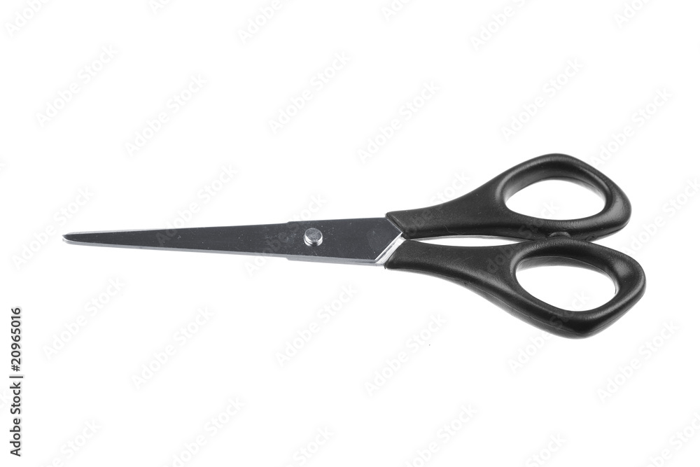 Modern metal scissors on a white background.. Modern metal scissors on a white background..