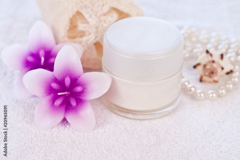 cream tube with seashell and pearls