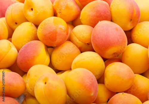 Fresh natural apricot to background