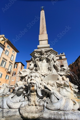 Rome: ancient fountain and egyptian column of Piazza Rotonda © mary416