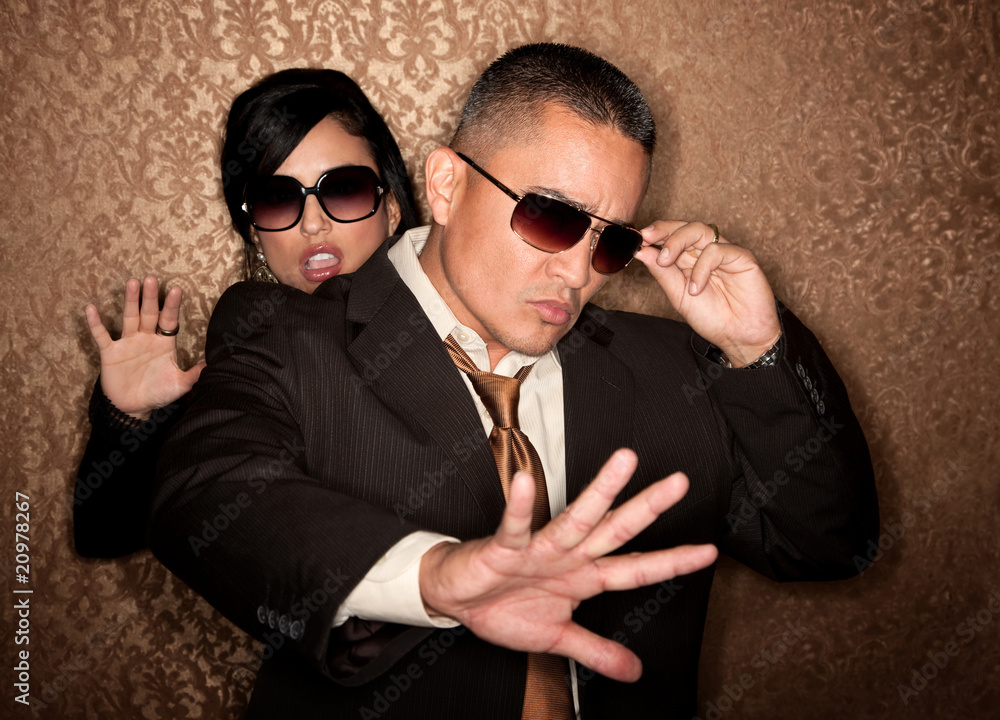 Hispanic couple caught in photographer flash Hispanic couple caught in photographer flash
