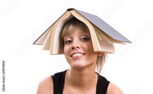 Student with book on her head