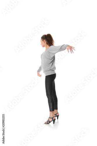 Young woman training rumba dance