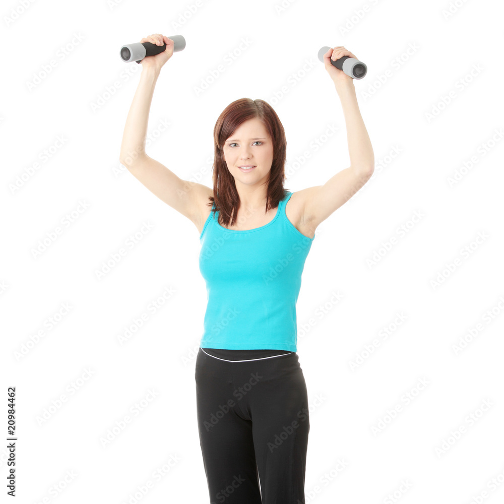 Girl with dumbbells Girl with dumbbells