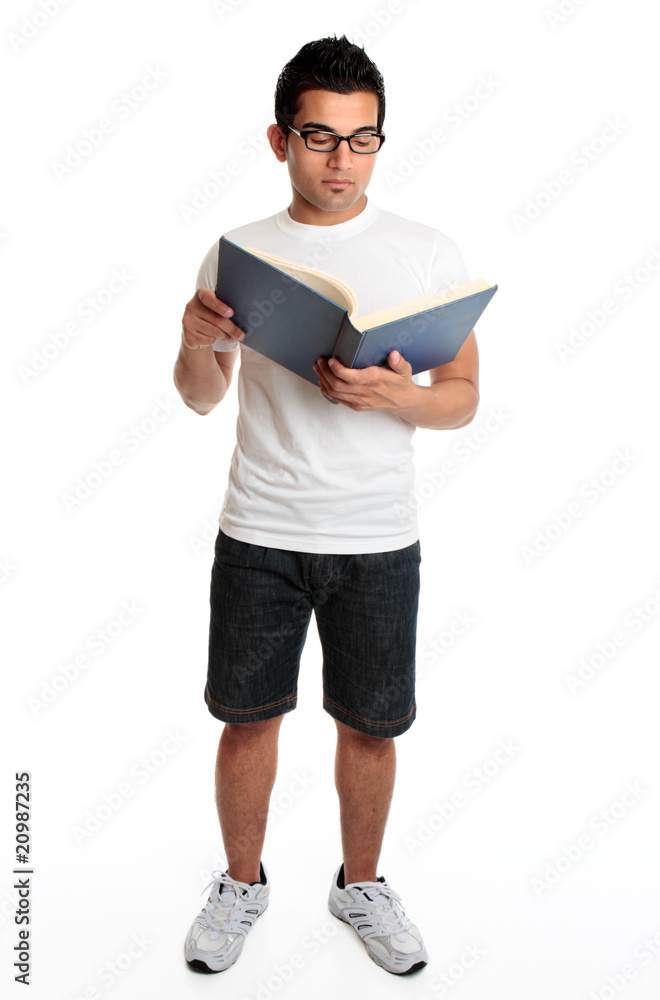 Man reading a hardcover book Man reading a hardcover book