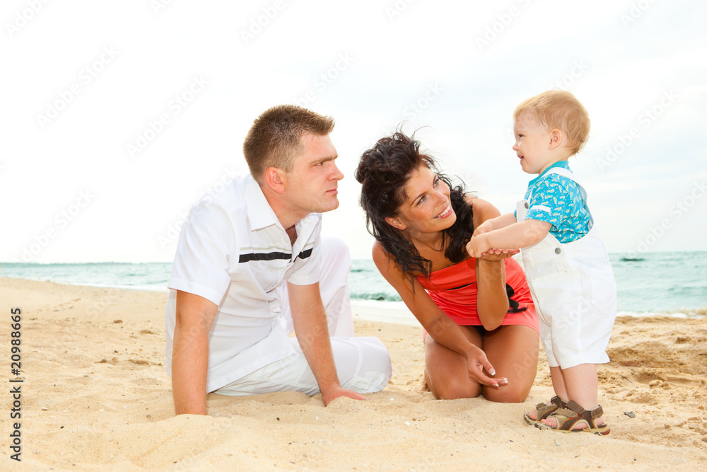 Parents with son at beach