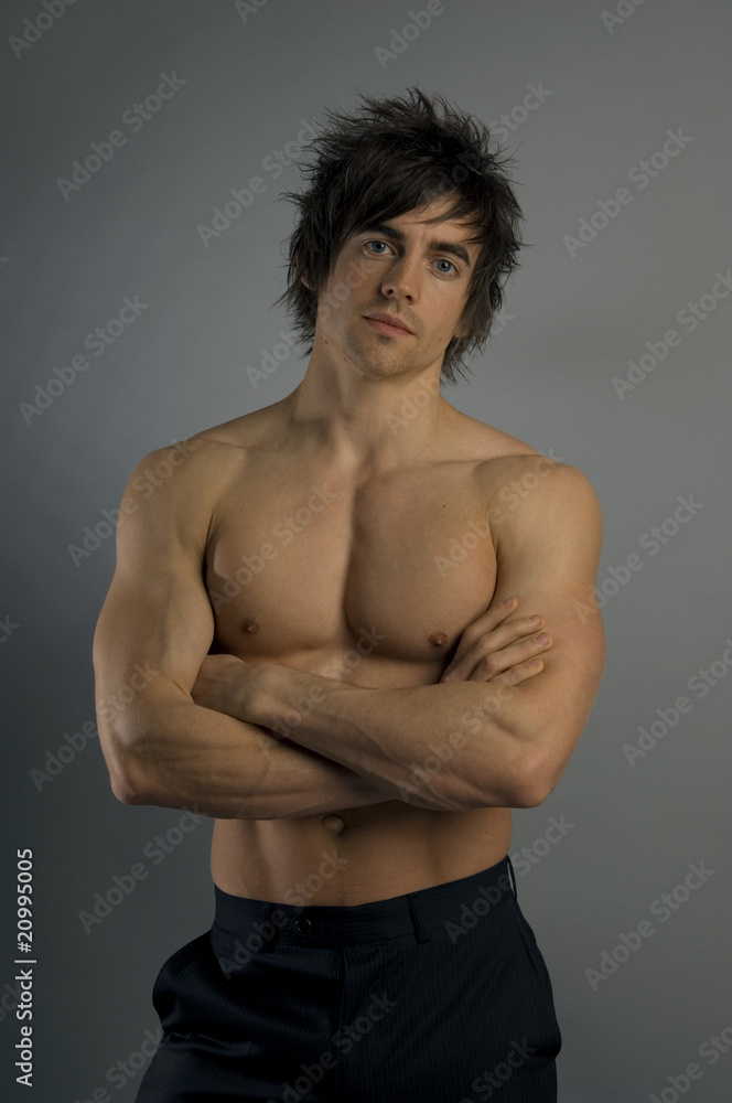 young man isolated on grey background young man isolated on grey background