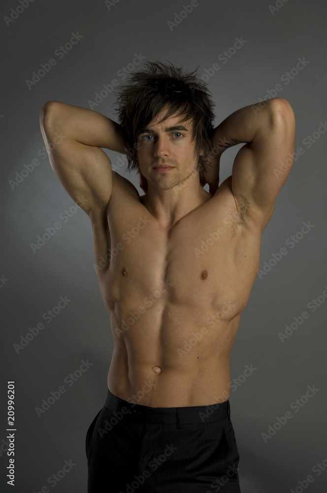 Fototapeta premium young man isolated on grey background