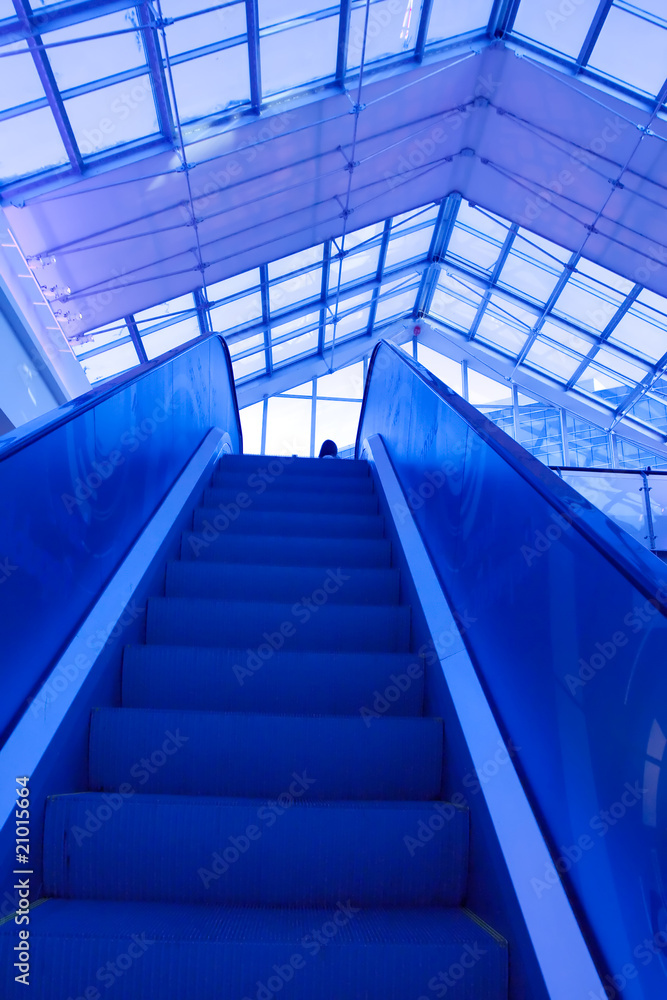 moving escalator in airport moving escalator in airport