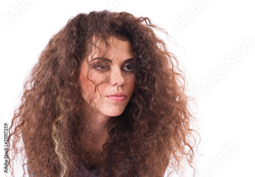 Desponded curly-headed girl
