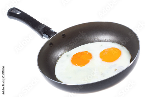 A fried eggs in a frying pan