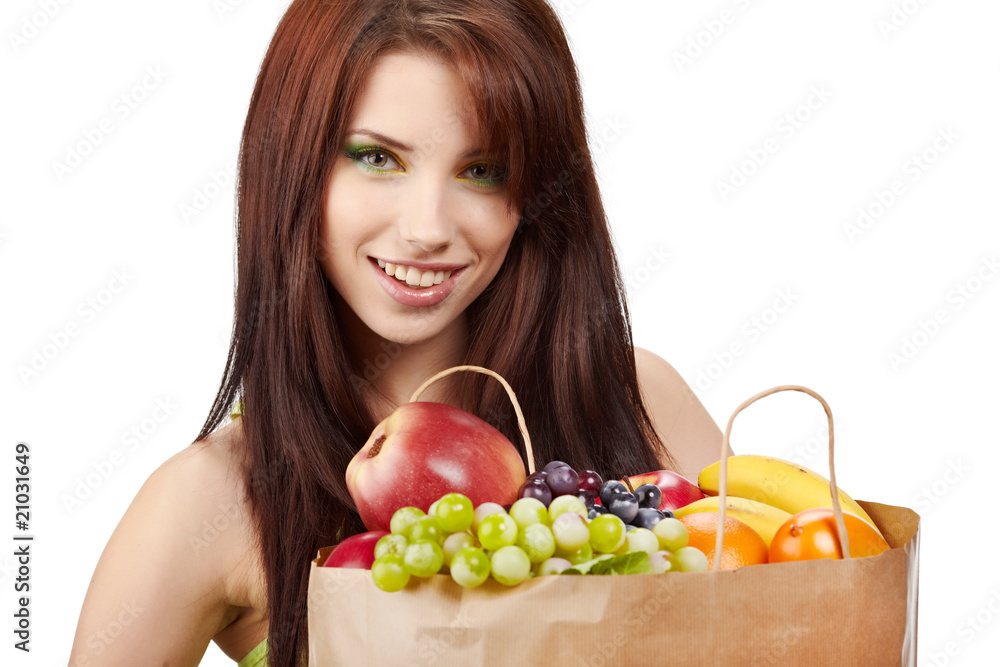 Smiling woman with fruits and vegetables. Over white background Smiling woman with fruits and vegetables. Over white background