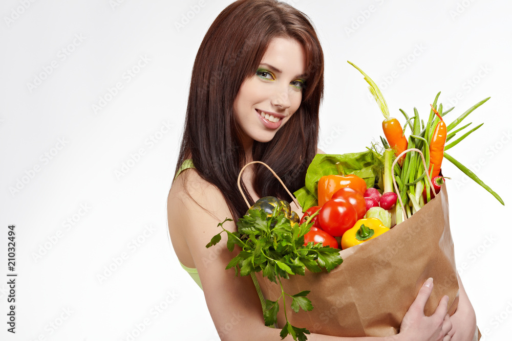 Smiling woman with fruits and vegetables. Smiling woman with fruits and vegetables.