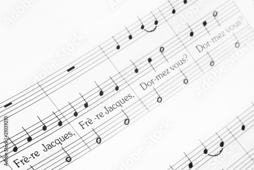 musical notes of melody Frère Jacques with selective focus