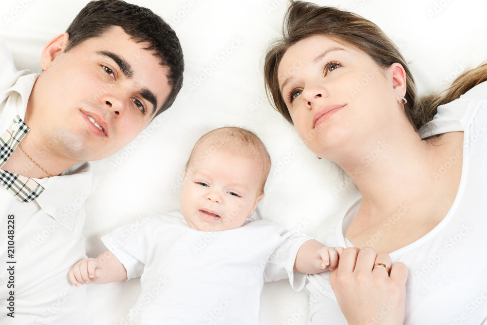 happy family - mother, father and baby happy family - mother, father and baby