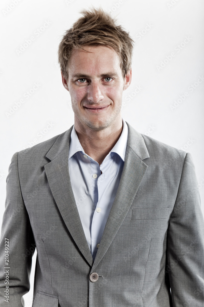 business man in grey suit on white background in studio business man in grey suit on white background in studio