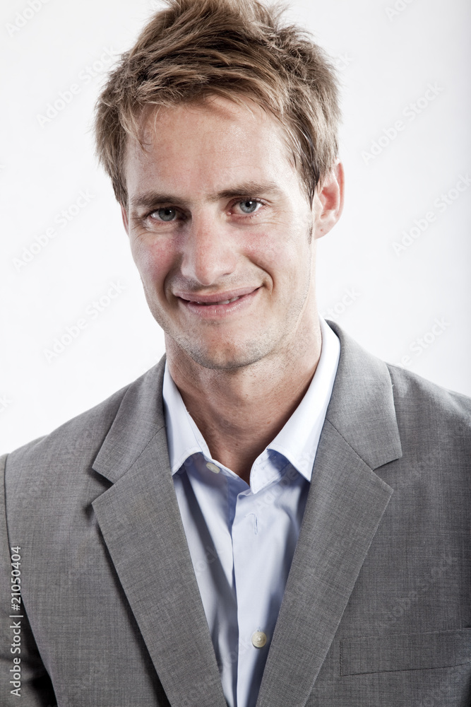 business man in grey suit on white background in studio business man in grey suit on white background in studio