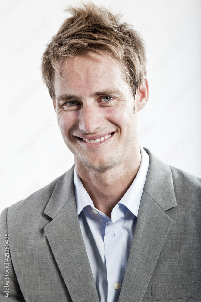 business man in grey suit on white background in studio business man in grey suit on white background in studio